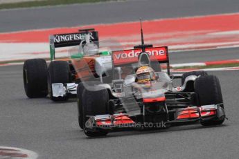 © Octane Photographic 2011. Formula 1 testing Sunday 20th February 2011 Circuit de Catalunya. McLaren MP4/26 - Lewis Hamilton, Force India VJM04 - Adrian Sutil. Digital ref : 0010LW7D3696