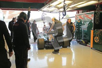 World © Octane Photographic 2011. Formula 1 testing Wednesday 9th March 2011 Circuit de Catalunya. Lotus garage. Lotus T124 - Jarno Trulli. Digital ref : 0020CB5D5724