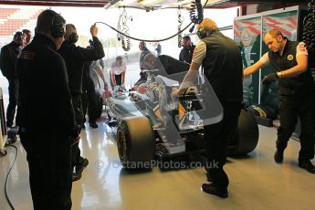 World © Octane Photographic 2011. Formula 1 testing Wednesday 9th March 2011 Circuit de Catalunya. Lotus garage. Lotus T124 - Jarno Trulli. Digital ref : 0020CB5D5725