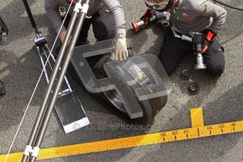 World © Octane Photographic 2011. Formula 1 testing Wednesday 9th March 2011 Circuit de Catalunya. McLaren MP4/26 - Lewis Hamilton tyre change practice. Digital ref : 0020LW7D0683