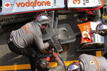 World © Octane Photographic 2011. Formula 1 testing Wednesday 9th March 2011 Circuit de Catalunya. McLaren MP4/26 - Lewis Hamilton tyre change practice. Digital ref : 0020LW7D0690