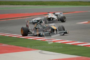 World © Octane Photographic 2011. Formula 1 testing Tuesday 8th March 2011 Circuit de Catalunya. Lotus T124 - Davide Valsecchi, Sauber C30 - Sergio Perez.  Digital ref : 0017CB1D0334