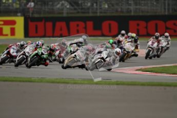© Octane Photographic Ltd. World Superbike Championship – Silverstone, Race 1. Sunday 5th August 2012. Leon Haslam leads the pack on the 1st start - BMW S1000RR - BMW Motorrad Motorsport. Digital Ref :