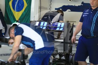 World © Octane Photographic Ltd. Williams Martini Racing, Williams Mercedes FW38 – Felipe Massa' s car being worked on with Brazilian flag in the background. Thursday 24th November 2016, F1 Abu Dhabi GP - Pitlane, Yas Marina circuit, Abu Dhabi. Digital Ref :