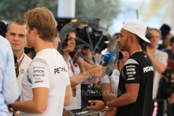 World © Octane Photographic Ltd. F1 Singapore GP paddock prior to the FIA Driver Press Conference part2, Yas Marina circuit, Abu Dhabi. Thursday 24th November 2016. Mercedes AMG Petronas – Lewis Hamilton and Nico Rosberg . Digital Ref :