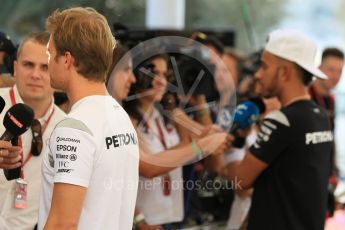 World © Octane Photographic Ltd. F1 Singapore GP paddock prior to the FIA Driver Press Conference part2, Yas Marina circuit, Abu Dhabi. Thursday 24th November 2016. Mercedes AMG Petronas – Lewis Hamilton and Nico Rosberg . Digital Ref :