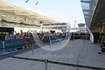 World © Octane Photographic Ltd. Mercedes AMG Petronas fans outside their garages. Thursday 24th November 2016, F1 Abu Dhabi GP - Pitlane. Yas Marina circuit, Abu Dhabi. Digital Ref :