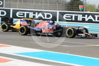 World © Octane Photographic Ltd. Scuderia Toro Rosso STR11 – Daniil Kvyat and Renault Sport F1 Team RS16 – Jolyon Palmer. Friday 25th November 2016, F1 Abu Dhabi GP - Practice 1, Yas Marina circuit, Abu Dhabi. Digital Ref :