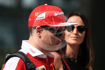 World © Octane Photographic Ltd. Scuderia Ferrari SF16-H – Kimi Raikkonen and wife Minttu Virtanen. Saturday 26th November 2016, F1 Abu Dhabi GP - Paddock, Yas Marina circuit, Abu Dhabi. Digital Ref : 1764LB1D0354