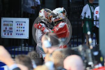 World © Octane Photographic Ltd. Scuderia Ferrari – Sebastian Vettel and Mercedes AMG Petronas – Lewis Hamilton. Sunday 20th March 2016, F1 Australian GP Race – Parc Ferme, Melbourne, Albert Park, Australia. Digital Ref : 1525LB1D7444