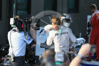 World © Octane Photographic Ltd. Mercedes AMG Petronas – Lewis Hamilton and Nico Rosberg. Sunday 20th March 2016, F1 Australian GP Race – Parc Ferme, Melbourne, Albert Park, Australia. Digital Ref : 1525LB1D7481