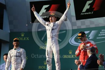 World © Octane Photographic Ltd. Mercedes AMG Petronas – Nico Rosberg, Lewis Hamilton and Scuderia Ferrari – Sebastian Vettel. Sunday 20th March 2016, F1 Australian GP Race - Podium, Melbourne, Albert Park, Australia. Digital Ref : 1525LB1D7709