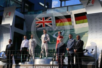 World © Octane Photographic Ltd. Mercedes AMG Petronas – Nico Rosberg, Lewis Hamilton and Scuderia Ferrari – Sebastian Vettel. Sunday 20th March 2016, F1 Australian GP Race - Podium, Melbourne, Albert Park, Australia. Digital Ref : 1525LB1D7755