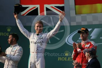 World © Octane Photographic Ltd. Mercedes AMG Petronas – Nico Rosberg, Lewis Hamilton and Scuderia Ferrari – Sebastian Vettel. Sunday 20th March 2016, F1 Australian GP Race - Podium, Melbourne, Albert Park, Australia. Digital Ref :