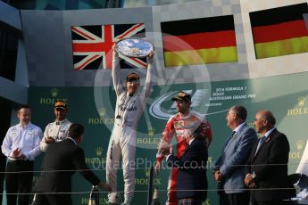World © Octane Photographic Ltd. Mercedes AMG Petronas – Nico Rosberg, Lewis Hamilton and Scuderia Ferrari – Sebastian Vettel. Sunday 20th March 2016, F1 Australian GP Race - Podium, Melbourne, Albert Park, Australia. Digital Ref : 1525LB1D7831