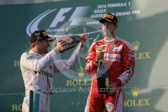 World © Octane Photographic Ltd. Mercedes AMG Petronas – Nico Rosberg and Scuderia Ferrari – Sebastian Vettel. Sunday 20th March 2016, F1 Australian GP Race - Podium, Melbourne, Albert Park, Australia. Digital Ref : 1525LB1D8003