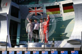 World © Octane Photographic Ltd. Mercedes AMG Petronas – Nico Rosberg, Lewis Hamilton and Scuderia Ferrari – Sebastian Vettel. Sunday 20th March 2016, F1 Australian GP Race - Podium, Melbourne, Albert Park, Australia. Digital Ref : 1525LB1D8096