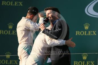 World © Octane Photographic Ltd. Mercedes AMG Petronas – Nico Rosberg and Mark Webber. Sunday 20th March 2016, F1 Australian GP Race - Podium, Melbourne, Albert Park, Australia. Digital Ref : 1525LB1D8133