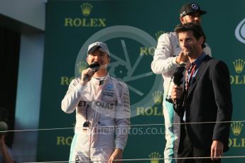 World © Octane Photographic Ltd. Mercedes AMG Petronas – Nico Rosberg and Mark Webber. Sunday 20th March 2016, F1 Australian GP Race - Podium, Melbourne, Albert Park, Australia. Digital Ref : 1525LB1D8150