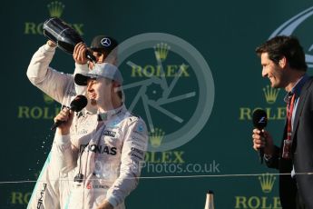 World © Octane Photographic Ltd. Mercedes AMG Petronas – Nico Rosberg and Mark Webber. Sunday 20th March 2016, F1 Australian GP Race - Podium, Melbourne, Albert Park, Australia. Digital Ref : 1525LB1D8157