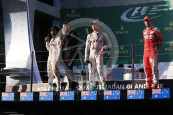 World © Octane Photographic Ltd. Mercedes AMG Petronas – Nico Rosberg, Lewis Hamilton and Scuderia Ferrari – Sebastian Vettel. Sunday 20th March 2016, F1 Australian GP Race - Podium, Melbourne, Albert Park, Australia. Digital Ref : 1525LB1D8279