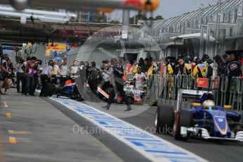 World © Octane Photographic Ltd. Haas F1 Team VF-16 – Romain Grosjean and Manor Racing MRT05 – Rio Haryanto. Saturday 19th March 2016, F1 Australian GP Practice 3, Melbourne, Albert Park, Australia. Digital Ref : 1519LB1D4653