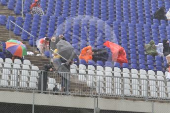 World © Octane Photographic Ltd. Fans in the grandstands during the thunderstorm. Friday 1st July 2016, F1 Austrian GP Practice 2, Red Bull Ring, Spielberg, Austria. Digital Ref : 1600CB1D2491