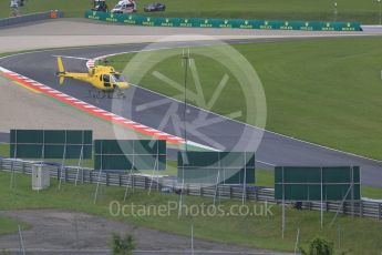 World © Octane Photographic Ltd. The TV helicopter making low passes. Friday 1st July 2016, F1 Austrian GP Practice 2, Red Bull Ring, Spielberg, Austria. Digital Ref : 1600CB5D3156
