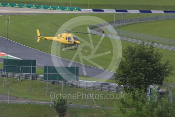 World © Octane Photographic Ltd. The TV helicopter making low passes. Friday 1st July 2016, F1 Austrian GP Practice 2, Red Bull Ring, Spielberg, Austria. Digital Ref : 1600CB5D3161