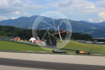 World © Octane Photographic Ltd. Renault Sport F1 Team RS16 - Kevin Magnussen and Mercedes AMG Petronas W07 Hybrid – Nico Rosberg. Friday . Friday 1st July 2016, F1 Austrian GP Practice 2, Red Bull Ring, Spielberg, Austria. Digital Ref : 1600LB1D5561