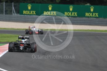 World © Octane Photographic Ltd. McLaren Honda MP4-31 – Fernando Alonso and Haas F1 Team VF-16 – Romain Grosjean. Friday 1st July 2016, F1 Austrian GP Practice 2, Red Bull Ring, Spielberg, Austria. Digital Ref : 1600LB1D6210