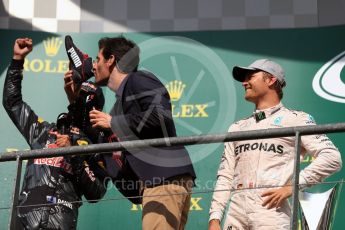 World © Octane Photographic Ltd. Red Bull Racing – Daniel Ricciardo offers champagne from his race boot to Mark Webber. Sunday 28th August 2016, F1 Belgian GP Race Podium, Spa-Francorchamps, Belgium. Digital Ref : 1693LB1D3425