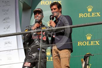 World © Octane Photographic Ltd. Red Bull Racing – Daniel Ricciardo offers champagne from his race boot to Mark Webber. Sunday 28th August 2016, F1 Belgian GP Race Podium, Spa-Francorchamps, Belgium. Digital Ref : 1693LB1D3445
