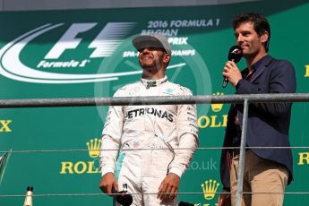 World © Octane Photographic Ltd. Mercedes AMG Petronas – Lewis Hamilton and Mark Webber. Sunday 28th August 2016, F1 Belgian GP Race Podium, Spa-Francorchamps, Belgium. Digital Ref : 1693LB1D3463