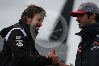 World © Octane Photographic Ltd. Scuderia Toro Rosso STR11 – Carlos Sainz and McLaren Honda MP4-31 – Fernando Alonso. . Sunday 10th July 2016, F1 British GP Drivers Parade, Silverstone, UK. Digital Ref :