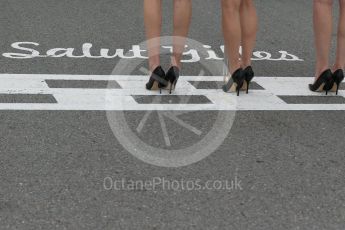 World © Octane Photographic Ltd. Grid Girls on the Start/Finish line with the famous Salut Gilles script. Sunday 12th June 2016, F1 Canadian GP Grid, Circuit Gilles Villeneuve, Montreal, Canada. Digital Ref :1591LB1D3237