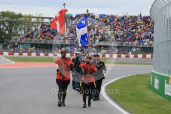 World © Octane Photographic Ltd. RCMP lead the Armed Forces march past. Sunday 12th June 2016, F1 Canadian GP Grid, Circuit Gilles Villeneuve, Montreal, Canada. Digital Ref :1591LB1D3248