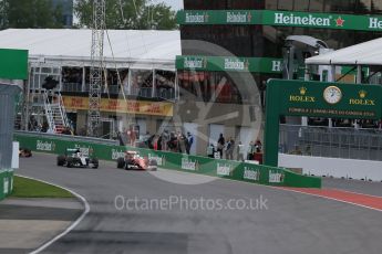 World © Octane Photographic Ltd. Scuderia Ferrari SF16-H – Sebastian Vettel alongside Mercedes AMG Petronas W07 Hybrid – Lewis Hamilton. Sunday 12th June 2016, F1 Canadian GP Race, Circuit Gilles Villeneuve, Montreal, Canada. Digital Ref :1592LB1D3395