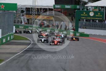 World © Octane Photographic Ltd. Scuderia Ferrari SF16-H – Sebastian Vettel take the lead from the start. Sunday 12th June 2016, F1 Canadian GP Race, Circuit Gilles Villeneuve, Montreal, Canada. Digital Ref :1592LB1D3407