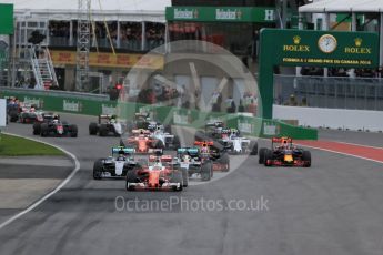 World © Octane Photographic Ltd. Scuderia Ferrari SF16-H – Sebastian Vettel takes the lead from the start. Sunday 12th June 2016, F1 Canadian GP Race, Circuit Gilles Villeneuve, Montreal, Canada. Digital Ref :1592LB1D3410