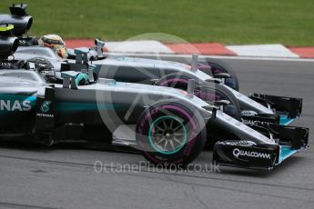 World © Octane Photographic Ltd. Mercedes AMG Petronas W07 Hybrid – Lewis Hamilton alongside Nico Rosberg. Sunday 12th June 2016, F1 Canadian GP Race, Circuit Gilles Villeneuve, Montreal, Canada. Digital Ref :1592LB1D3442