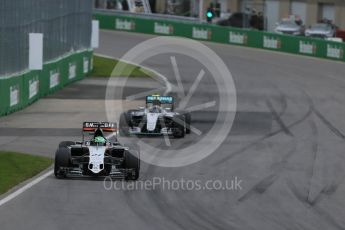World © Octane Photographic Ltd. Sahara Force India VJM09 - Nico Hulkenberg and Mercedes AMG Petronas W07 Hybrid – Nico Rosberg. Sunday 12th June 2016, F1 Canadian GP Race, Circuit Gilles Villeneuve, Montreal, Canada. Digital Ref :1592LB1D3706
