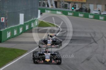 World © Octane Photographic Ltd. Scuderia Toro Rosso STR11 – Carlos Sainz and Daniil Kvyat. Sunday 12th June 2016, F1 Canadian GP Race, Circuit Gilles Villeneuve, Montreal, Canada. Digital Ref :1592LB1D3723