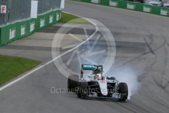 World © Octane Photographic Ltd. Mercedes AMG Petronas W07 Hybrid – Lewis Hamilton locks up the front left. Sunday 12th June 2016, F1 Canadian GP Race, Circuit Gilles Villeneuve, Montreal, Canada. Digital Ref :1592LB1D3928