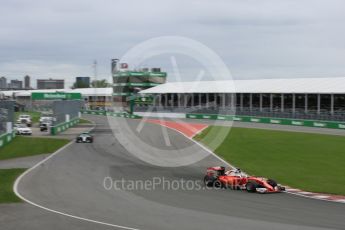 World © Octane Photographic Ltd. Scuderia Ferrari SF16-H – Sebastian Vettel ahead of Mercedes AMG Petronas W07 Hybrid – Lewis Hamilton. Sunday 12th June 2016, F1 Canadian GP Race, Circuit Gilles Villeneuve, Montreal, Canada. Digital Ref :1592LB5D2283