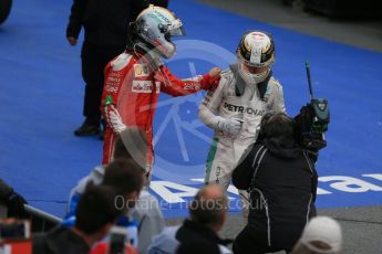 World © Octane Photographic Ltd. Mercedes AMG Petronas – Lewis Hamilton (1st) and Scuderia Ferrari – Sebastian Vettel (2nd). Sunday 12th June 2016, F1 Canadian GP Parc Ferme, Circuit Gilles Villeneuve, Montreal, Canada. Digital Ref :1593LB1D4214