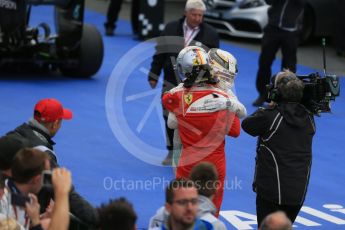 World © Octane Photographic Ltd. Mercedes AMG Petronas – Lewis Hamilton (1st) and Scuderia Ferrari – Sebastian Vettel (2nd). Sunday 12th June 2016, F1 Canadian GP Parc Ferme, Circuit Gilles Villeneuve, Montreal, Canada. Digital Ref :1593LB1D4231