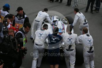 World © Octane Photographic Ltd. Williams Martini Racing, – Valtteri Bottas' car is pushed in to Parc Ferme. Sunday 12th June 2016, F1 Canadian GP Parc Ferme, Circuit Gilles Villeneuve, Montreal, Canada. Digital Ref :1593LB1D4279