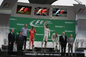 World © Octane Photographic Ltd. Mercedes AMG Petronas – Lewis Hamilton (1st), Scuderia Ferrari – Sebastian Vettel (2nd) and Williams Martini Racing, – Valtteri Bottas (3rd) with Mercedes AMG Petronas Head of Electronics – Evan Short (Constructors’ Trophy). Sunday 12th June 2016, F1 Canadian GP Podium, Circuit Gilles Villeneuve, Montreal, Canada. Digital Ref :1593LB1D4404