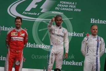 World © Octane Photographic Ltd. Mercedes AMG Petronas – Lewis Hamilton (1st), Scuderia Ferrari – Sebastian Vettel (2nd) and Williams Martini Racing, – Valtteri Bottas (3rd). Sunday 12th June 2016, F1 Canadian GP Podium, Circuit Gilles Villeneuve, Montreal, Canada. Digital Ref :1593LB1D4422